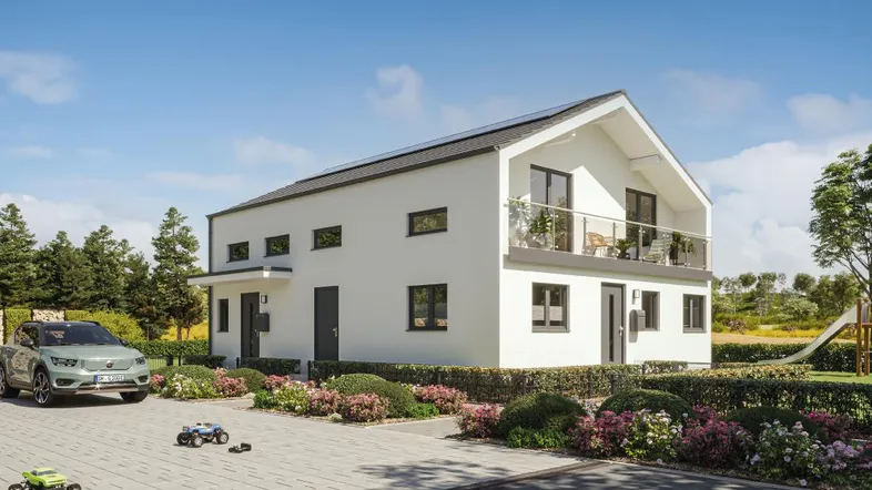 Modernes Einfamilienhaus mit Satteldach, Balkon und Photovoltaikanlage in grüner Umgebung.