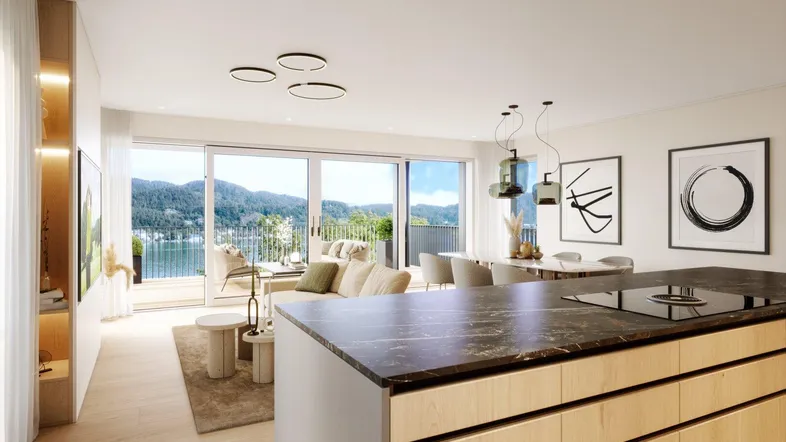 Moderne offene Wohnküche mit Essbereich, Seeblick und Zugang zum Balkon.