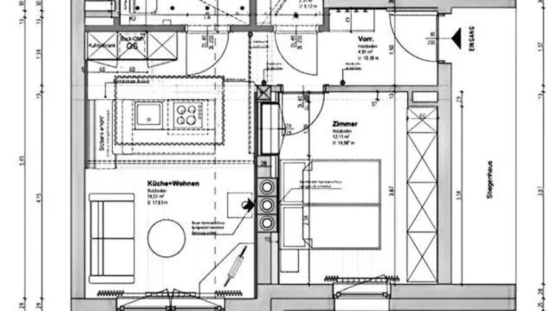 Detaillierter Grundriss einer Wohnung mit offener Küche, Wohnbereich, Schlafzimmer und Balkon.