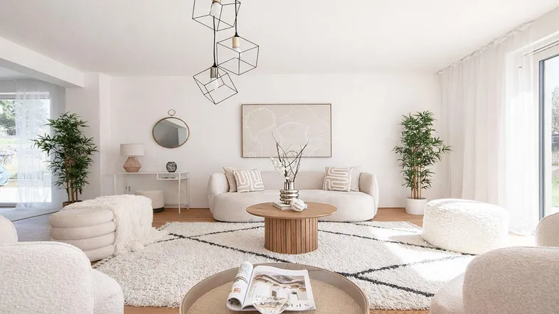 Helles Wohnzimmer mit modernen Möbeln, Holzboden und Zugang zu einem Außenbereich.