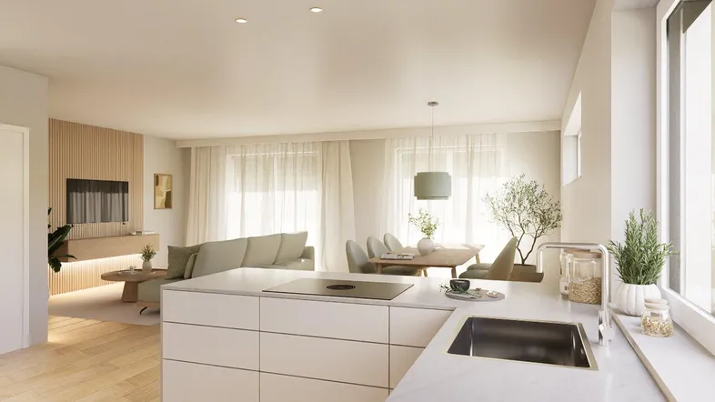 Helle, offene Wohnküche mit Essbereich und gemütlichem Wohnzimmer, ideal für modernes Wohnen.