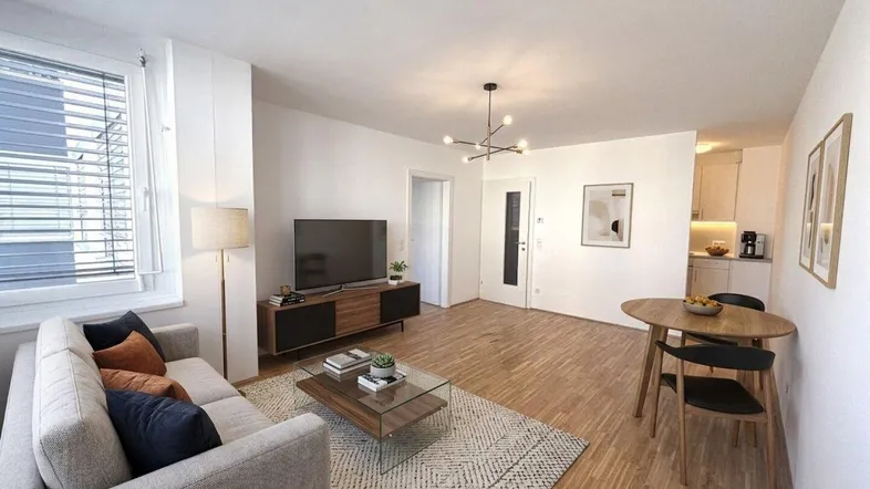 Helles, modern eingerichtetes Wohn-Esszimmer mit Parkettboden und Blick nach draußen.