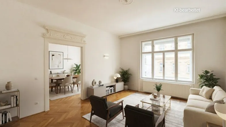 Helles Wohnzimmer mit Fischgrätparkett, Stuckdecke und Blick in den Essbereich, modern eingerichtet.