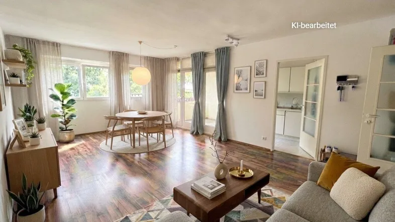 Helles Wohn- und Esszimmer mit Holzboden, modernen Möbeln und Zugang zum Balkon.