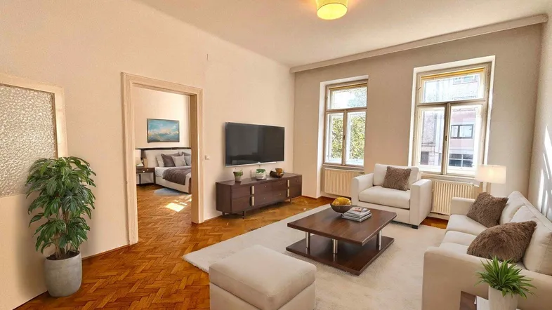 Helles Wohnzimmer mit Parkettboden, modernen Möbeln und Blick in ein Schlafzimmer.