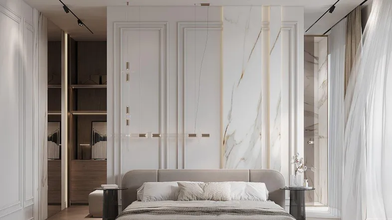 Modernes Schlafzimmer mit großem Bett, eleganter Marmorwand und integrierten Schränken. Der Raum wirkt luxuriös und hell.