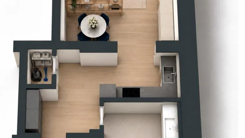 Moderner Grundriss einer Studiowohnung mit offenem Wohnbereich, separater Küche und Bad.