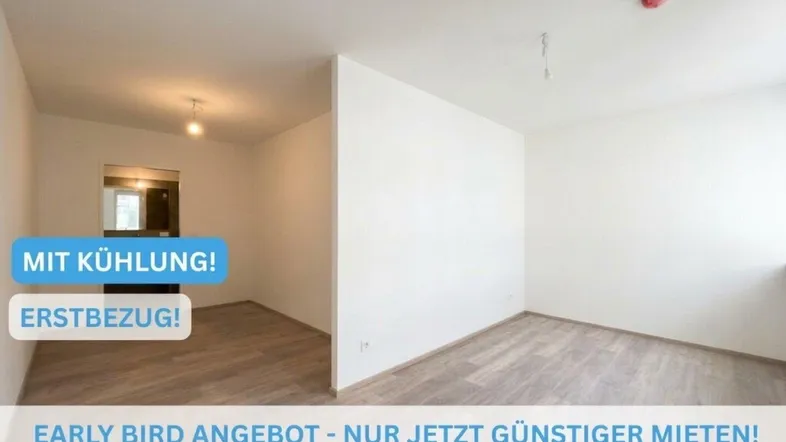 Heller, leerer Raum mit modernem Bodenbelag und weißen Wänden, bereit für den Erstbezug.
