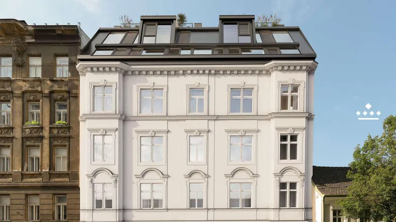 Modernes Gebäude mit Dachausbau und vielen Fenstern in urbaner Umgebung.