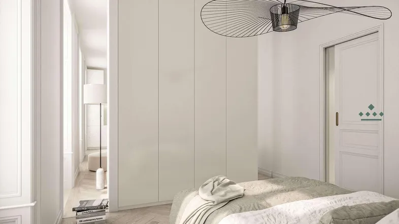 Helles Schlafzimmer mit Einbauschränken, modernem Design und Fischgrätparkettboden.