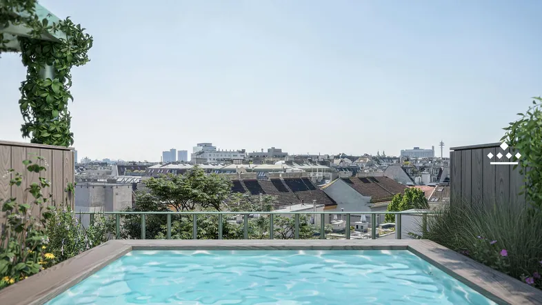 Exklusiver Pool auf der Dachterrasse mit Panoramablick über die Stadt und umliegende Gebäude.