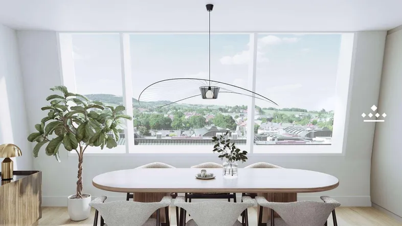 Moderner Essbereich mit großem Fenster, das einen weiten Blick über die Stadt und Landschaft bietet.