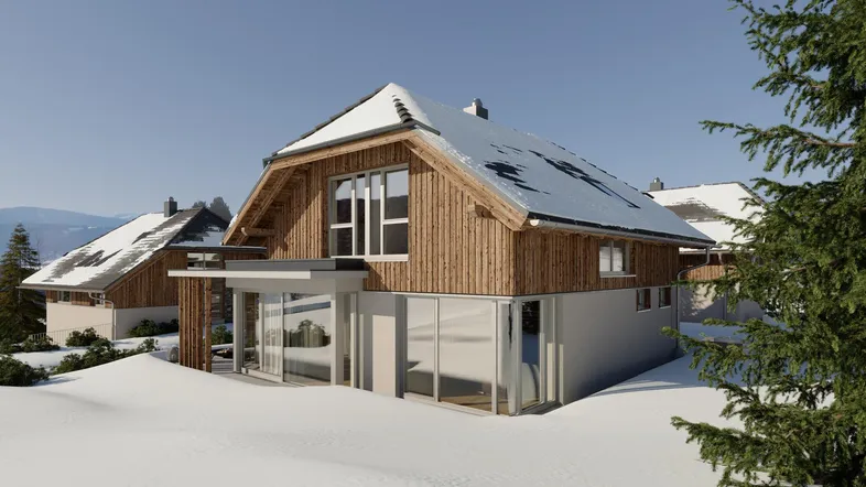 Moderne alpine Architektur in verschneiter Landschaft mit Holzfassade und großen Fenstern.