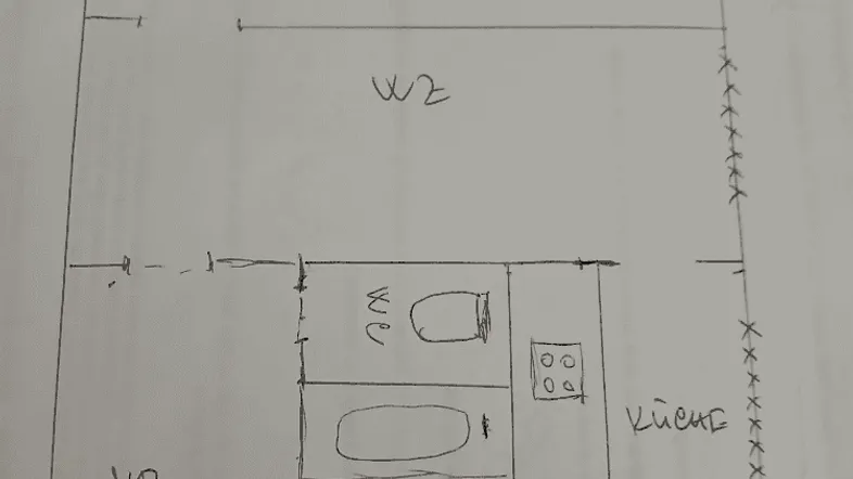 Handgezeichneter Grundrissplan mit Aufteilung in Wohnzimmer, Schlafzimmer, Küche und Bad.