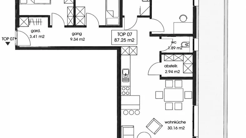 Grundriss einer Wohnung mit drei Zimmern, offener Wohnküche und großer Terrasse.