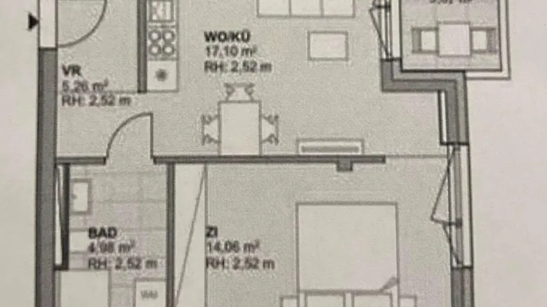 Grundriss einer modernen Wohnung mit offenem Wohn-/Kochbereich, Schlafzimmer und Balkon.