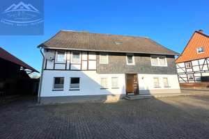 Freistehendes Mehrfamilienhaus in Northeim-Langenholtensen – Untere Dorfstraße 21, 37154 Northeim – Vorschaubild 1