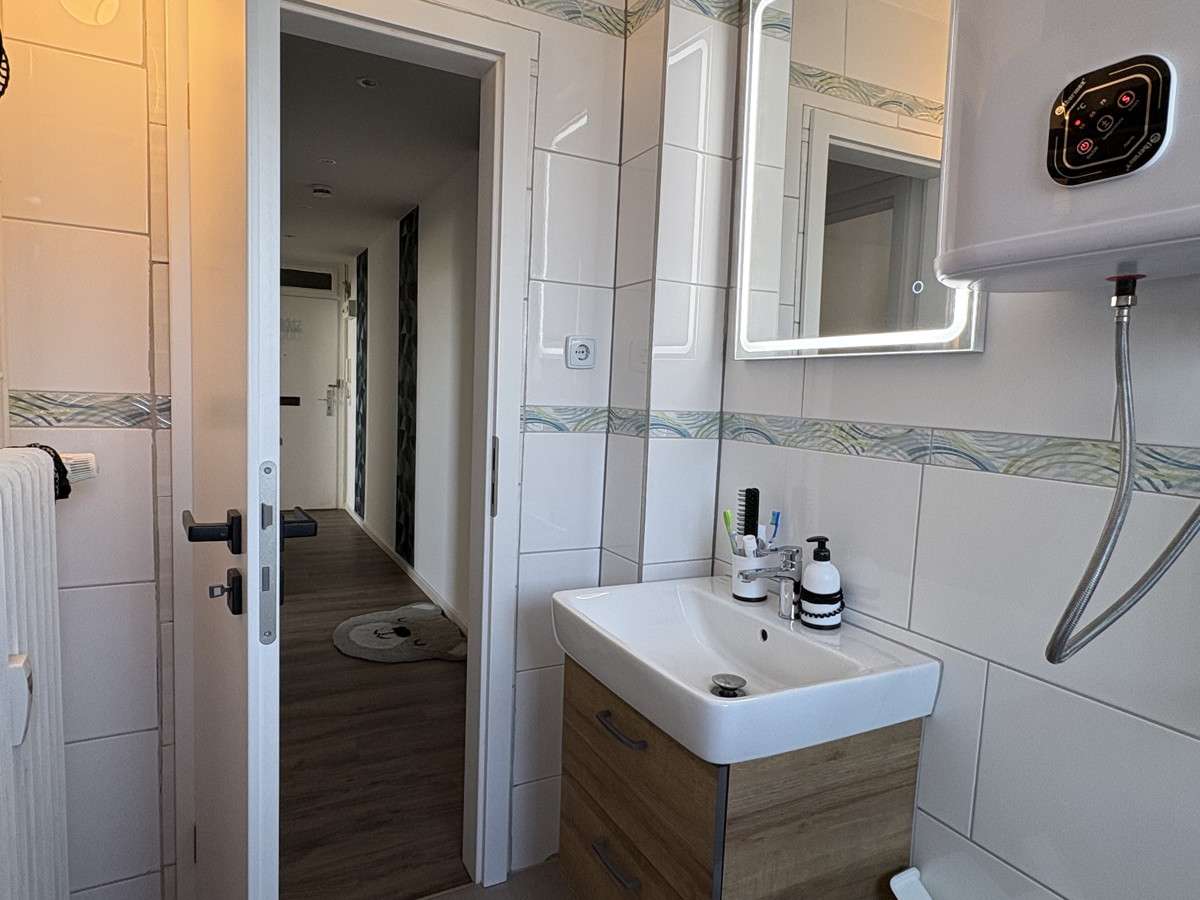 Immobilie in Bad Nenndorf - KARSTEN IMMOBILIEN ermöglicht Ihnen: Moderne DG-Wohnung mit großem Balkon und Top-Ausstattung - Bild 9