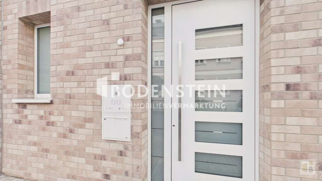 Immobilie in Nieder-Olm - Hochwertiges Stadthaus im KfW-40-Plus-Standard in zentraler Lage von Nieder-Olm - Bild 2