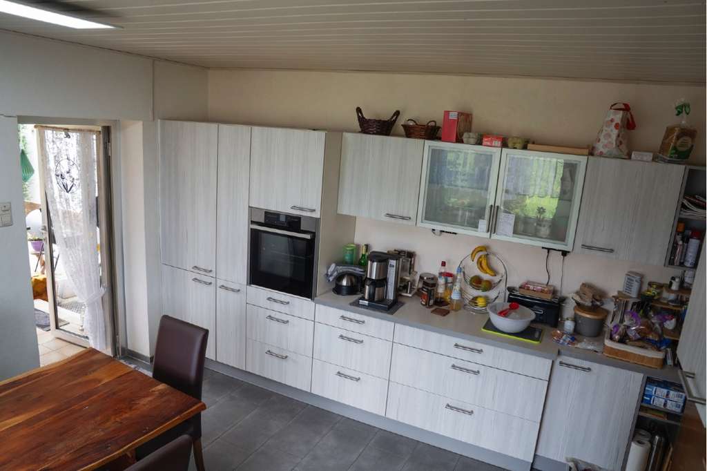 Immobilie in Harsewinkel - Doppelhaushälfte auf großem Grundstück – neuwertige Pelletheizung inklusive - Bild 1