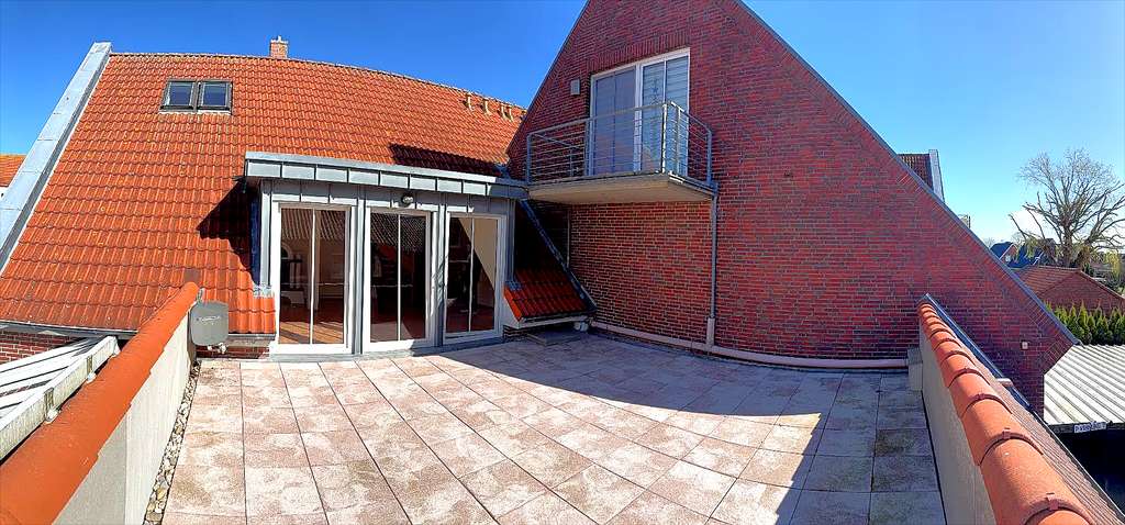 Großzügige Etagenwohnung mit Dachterrasse - Wohnen mitten im idyllischen Carolinensiel