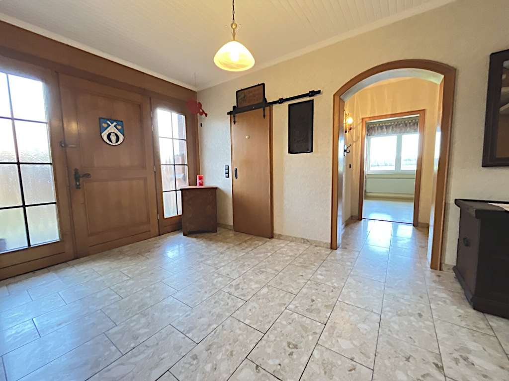 Immobilie in Neustadt am Rübenberge - ***Solider Winkelbungalow mit viel Platz in ruhiger Feldrandlage*** - Bild 1