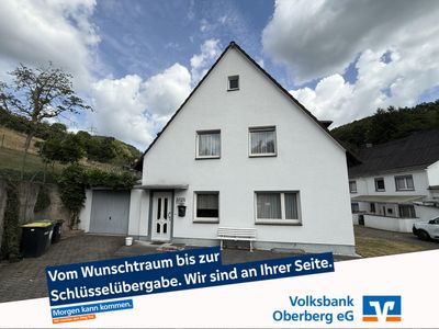 Solides Einfamilienhaus mit großem Grundstück