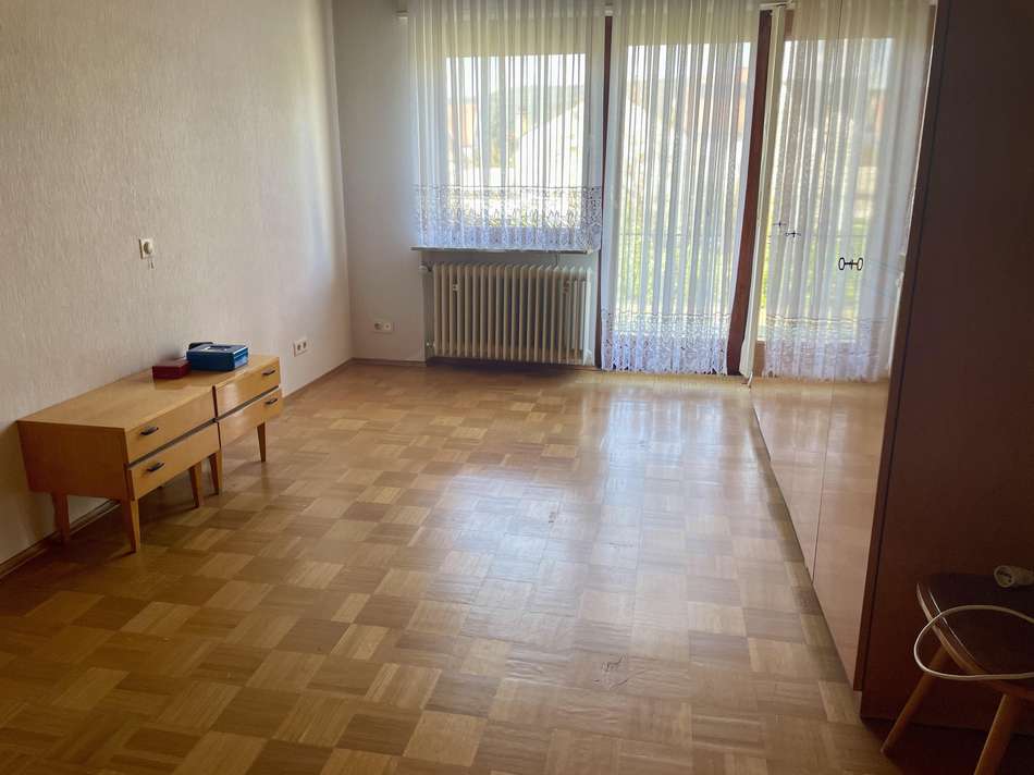 Schlafzimmer mit Balkonzugang