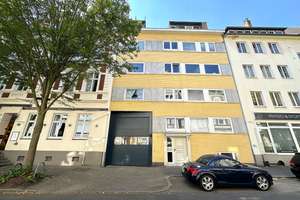 Charmante 2-Zimmer-Eigentumswohnung mit Garten, ausgebautem Kellerraum inklusive WC und Garage in be
