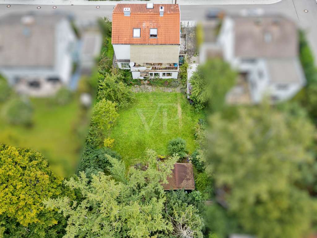 Immobilie in Gräfelfing - Ansprechendes Zweifamilienhaus mit Wintergarten und viel Platz im Grünen - Bild 4