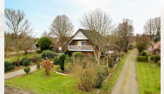 Bild von Einfamilienhaus mit Einliegerwohnung und Garage – Wohnen nahe dem Golfplatz