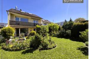 Freistehendes Zweifamilienhaus mit sonnigem Garten in ruhiger Lage - teilvermietet