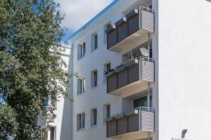 Offener Wohn- und Kochbereich – Stilvolle Wohnung mit Loggia und Grünblick – Kurt-Schumacher-Ring 3, 38444 Wolfsburg – Vorschaubild 3