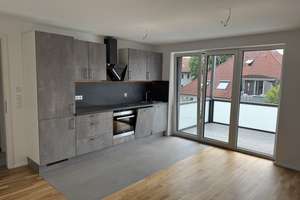 Erstbezug | Exklusive 2-Zimmer Wohnung | Einbauküche | Balkon | Einzelgarage | KFW55 | ER-Zentrum