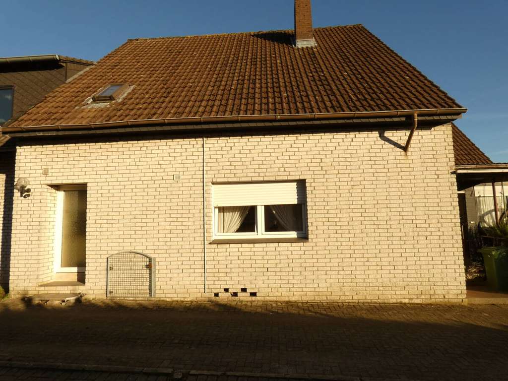 Immobilie in Dissen - Solides Wohnhaus mit Garage und Gartenanteil in ruhiger Siedlungslage von Dissen aTW - Bild 2