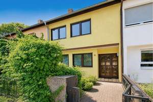Familientraum mit Sonnenterrasse und  großem Garten in ruhiger Lage