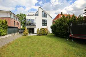 3-Zimmer-Terrassenwohnung mit eigenem Gartenanteil!