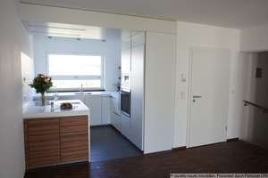 Zukunftsorientiertes und umweltbewusstes Wohnen : Modernes Architekten-Reihenhaus als Passivhaus