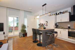 Exklusive Maisonette mit großzügigem Balkon – historischer Charme trifft modernen Wohnkomfort