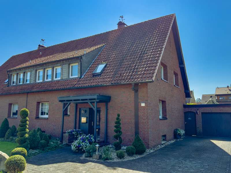 Stilvolles Wohnen in idyllischer Lage: Traumhafte Doppelhaushälfte mit Gartenparadies in Hamm-Heesse