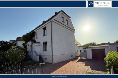 Charmante Doppelhaushäfte mit großem Garten