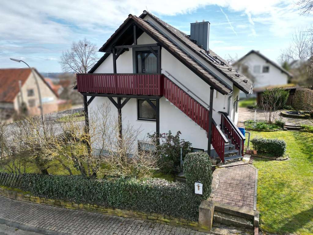 Immobilie in Marktheidenfeld - Ein Zuhause, das mit Ihrer Familie wächst – vielseitiges Einfamilienhaus mit Garten und separaten Wo - Bild 2