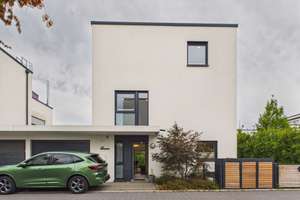 Exklusives und neuwertiges Einfamilienhaus mit Garten, Garage & traumhafter Dachterrasse!