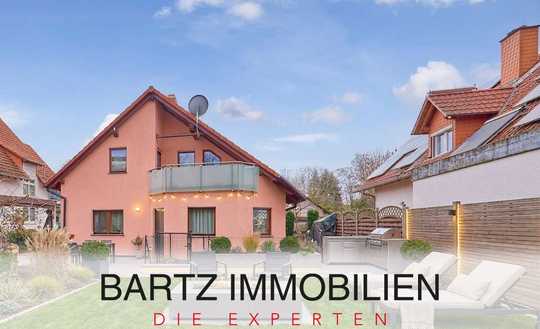 Familienfreundliches Einfamilienhaus mit lichtdurchflutetem Wohnbereich & weitläufigem Garten