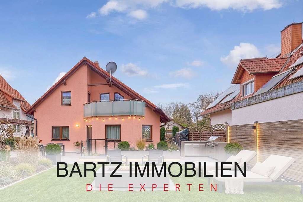 Immobilie in Weingarten (Pfalz) - Familienfreundliches Einfamilienhaus mit lichtdurchflutetem Wohnbereich & weitläufigem Garten - Bild 0