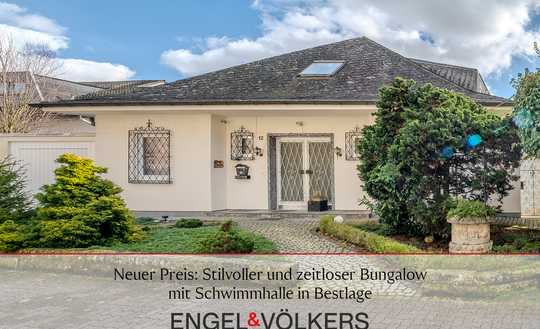 Neuer Preis: Stilvoller und zeitloser Bungalow mit Schwimmhalle in Bestlage