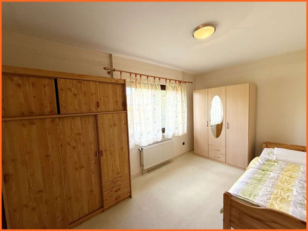 Immobilie in Gau-Bickelheim - Charmantes Einfamilienhaus mit Wellnessbereich, großem Garten und Weinbergblick! - Bild 8