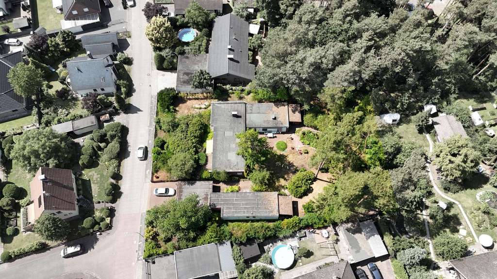 Immobilie in Hambühren - Zwei freistehende Bungalows auf großem Grundstück - Bild 3