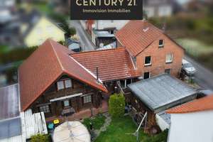 Charmantes Investment-Duo: Massives Zweifamilienhaus & Holzbohlenhaus EEK A+ – Die vollständige Adresse der Immobilie erhältst du vom Anbieter., 31191 Algermissen – Vorschaubild 1