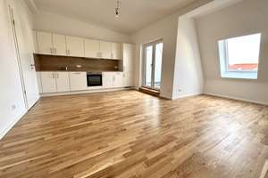 Sofort einziehen! Helle 5-Zimmer-Dachgeschosswohnung im Erstbezug mit EBK, 2 Bädern und Loggia